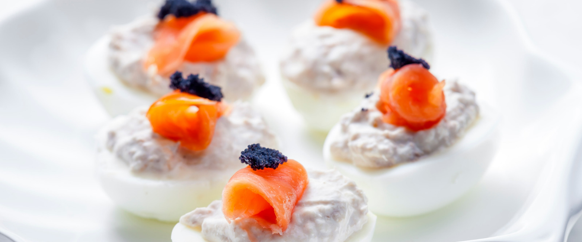 fried eggs with jamon and caviar
